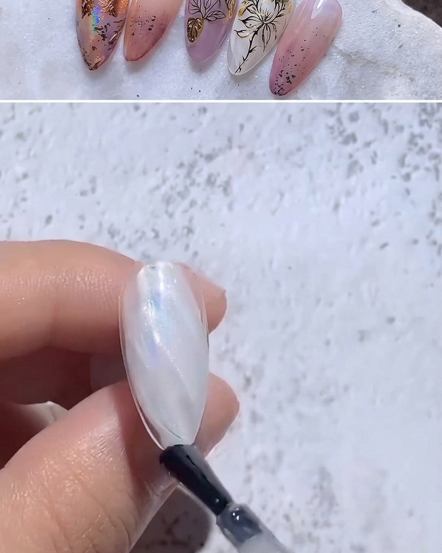 Applicazione di un top coat lucido su ununghia con effetto aurora.