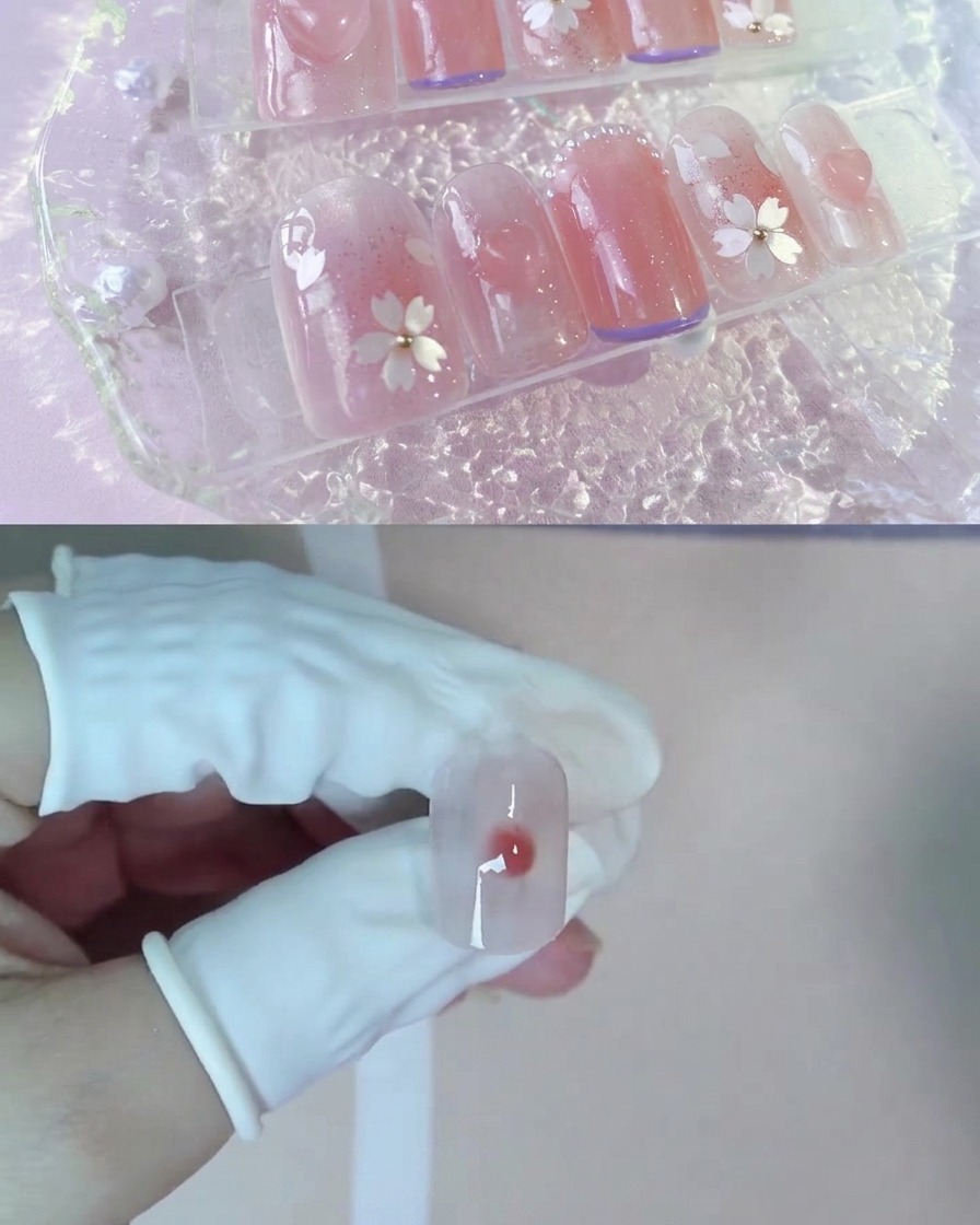 Una goccia di gel pesca nude più scuro posizionata al centro del blooming gel bagnato su ununghia.