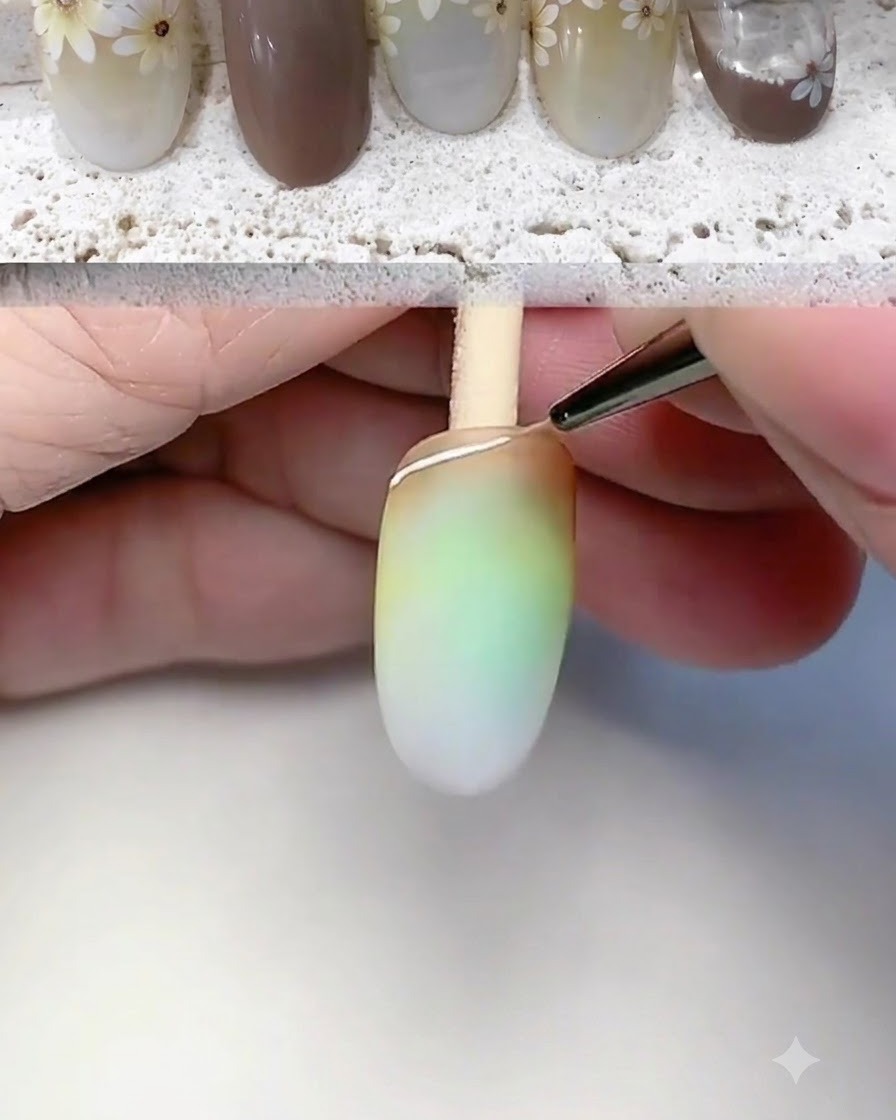 Un pennello a punta fine disegna un contorno bianco e una linea di base sulla punta dellunghia.