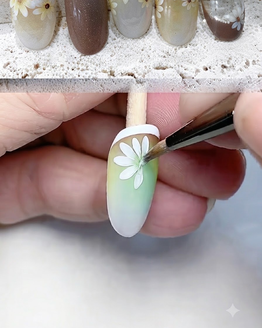 Un pennello a punta fine dipinge e definisce con cura i petali bianchi della margherita su una tip sfumata.