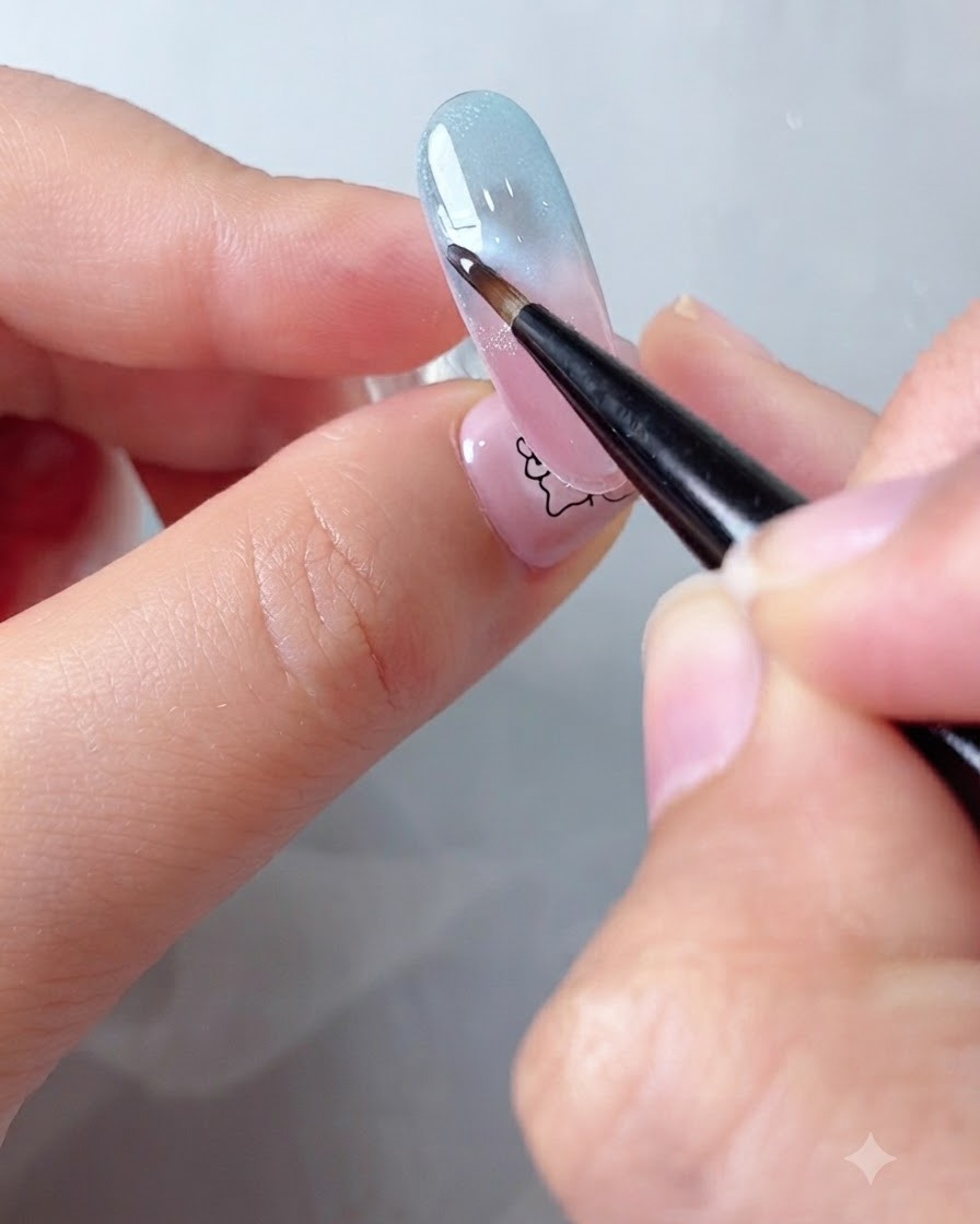 Un pennellino che diffonde i bordi del gel nuvola bianco su uno sfondo sfumato utilizzando il blooming gel.