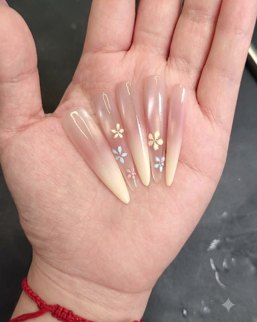 Applicazione del gel cat-eye bianco sulla metà superiore dellunghia usando un pennello fine.