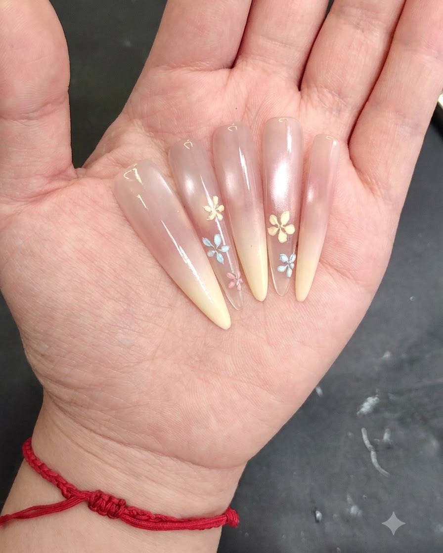 Primo piano dellapplicazione di gel duro sopra i petali del fiore per un effetto 3D strutturato.