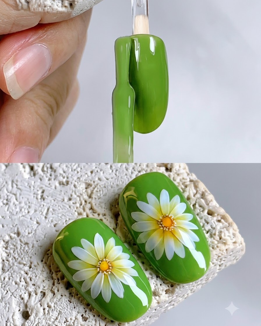 Un pennello per unghie applica uno smalto gel verde vibrante sulla superficie di un tip per unghie a forma ovale.