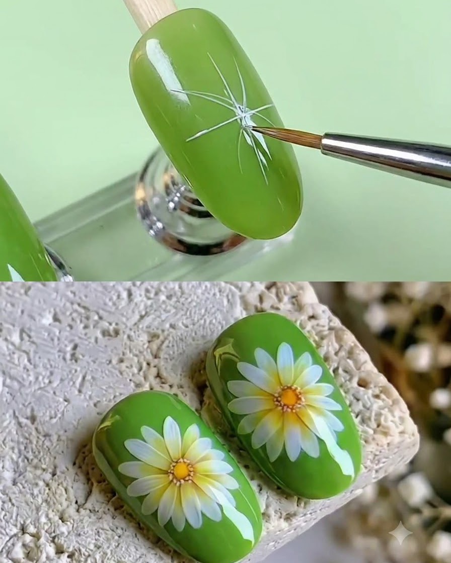 Un pennello fine dipinge tratti allungati di petali bianchi che si irradiano da un punto centrale su ununghia verde.