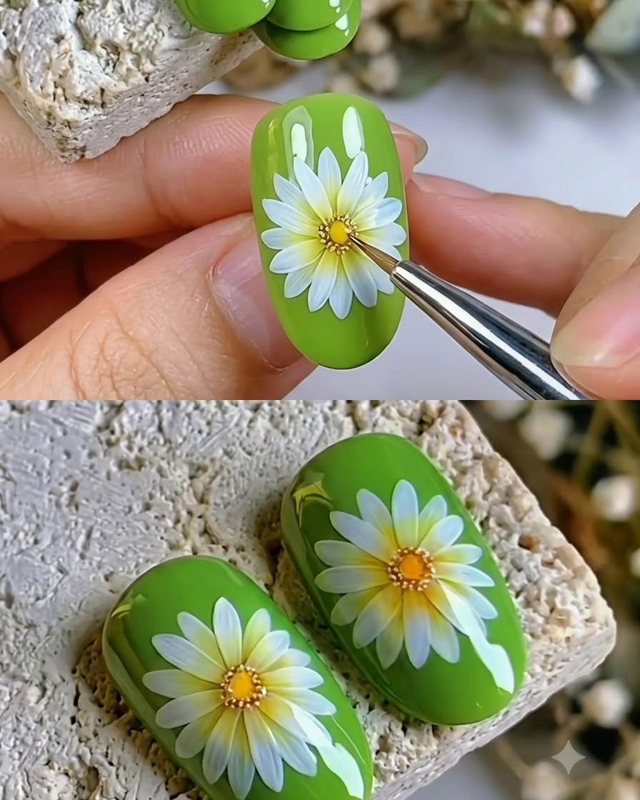 Un pennello fine che applica la mano trasparente di sigillatura finale su un design per unghie con margherita finito.
